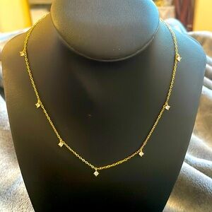 Gold tone crystal diamonteé flutter station choker necklace